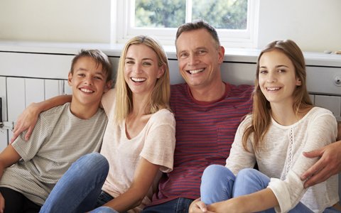 Family smiling with great gums Lanap laser therapy