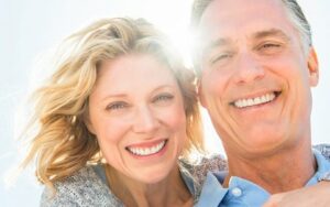 Older man and woman couple smiling