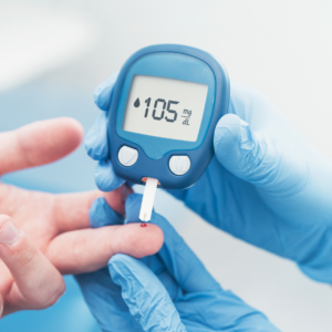 Diabetes patient checking blood sugar with a glucometer